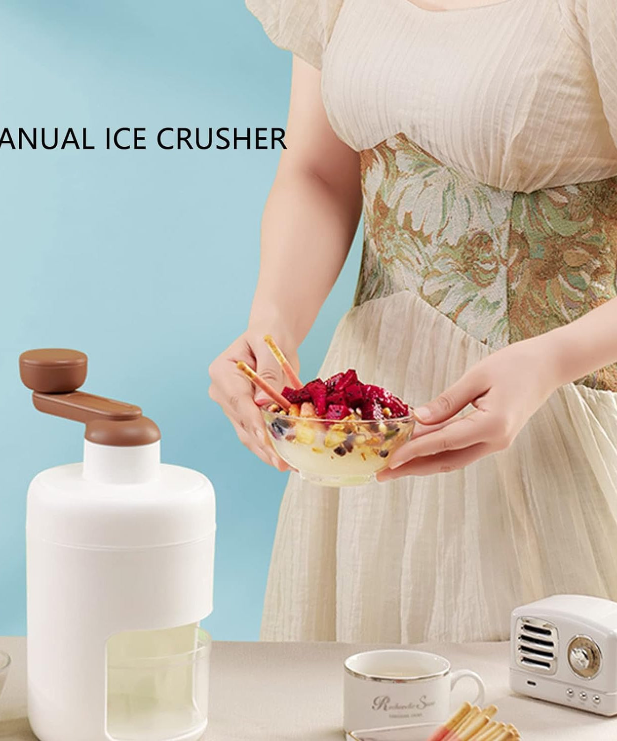 Mini household ice crusher, hand-operated for shaved ice.