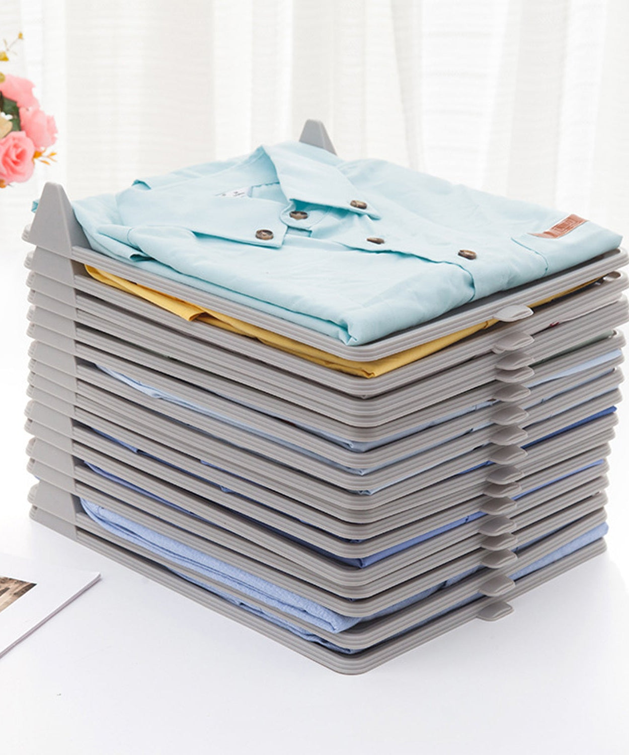 Versatile fabric organizer for organized cloth storage in ironing shops.