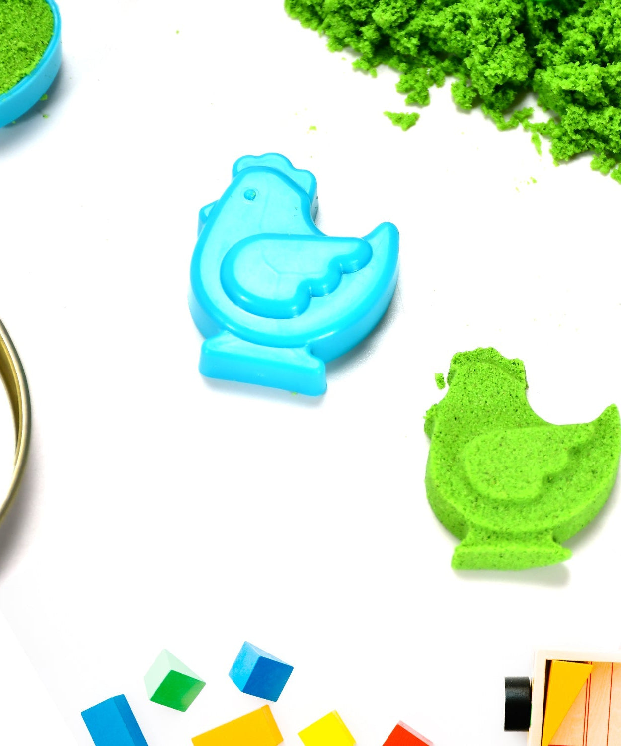 Box of natural kinetic sand for kids' activities.