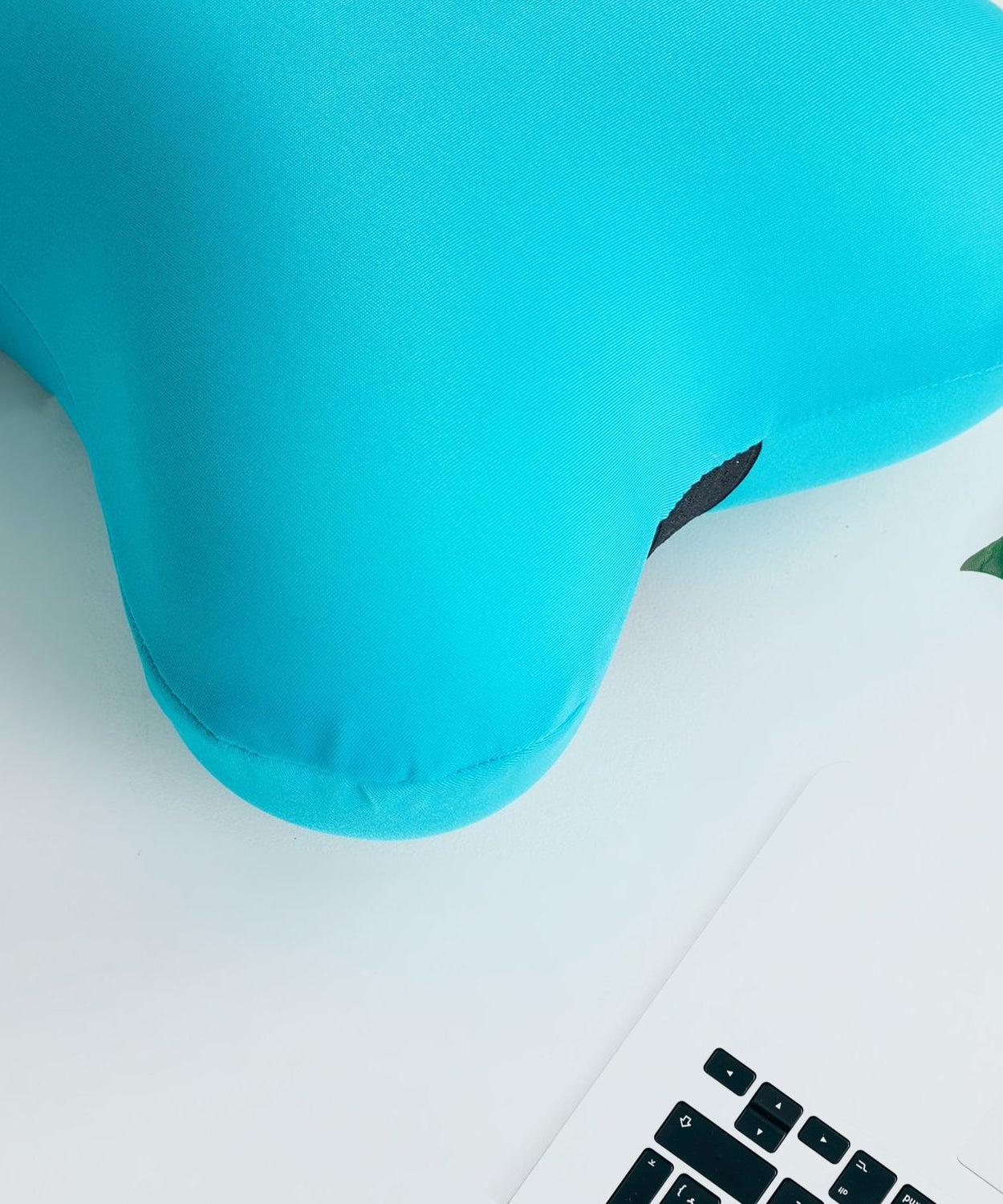 Detailed view of the neck support pillow's texture.