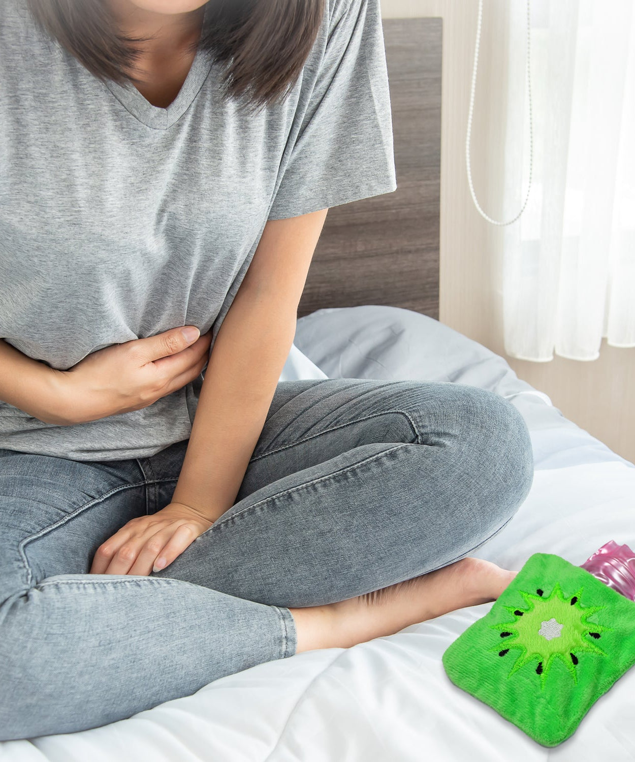 Green sun hot water bag for warmth and relief from body aches