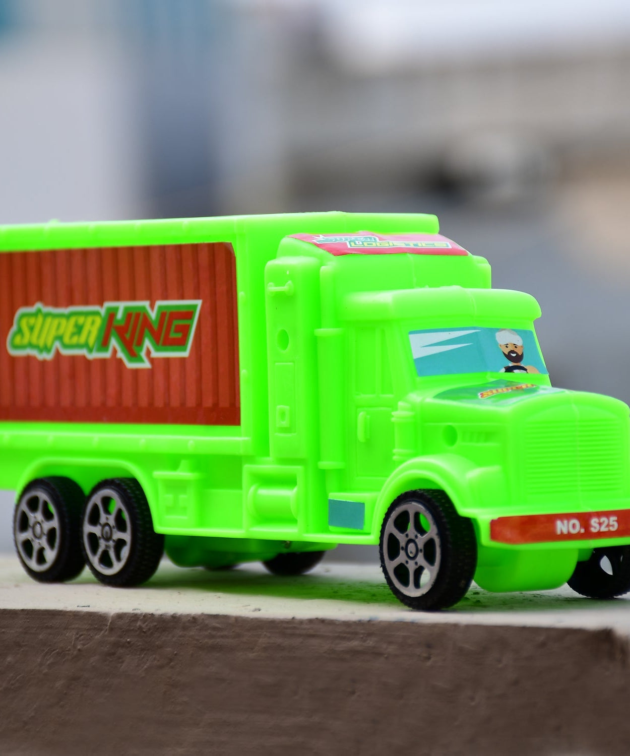 Plastic toy truck with cargo, designed for kids