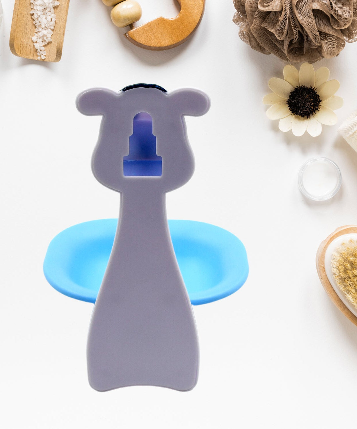 Bathroom soap dish with a playful cartoon design, ideal for children.