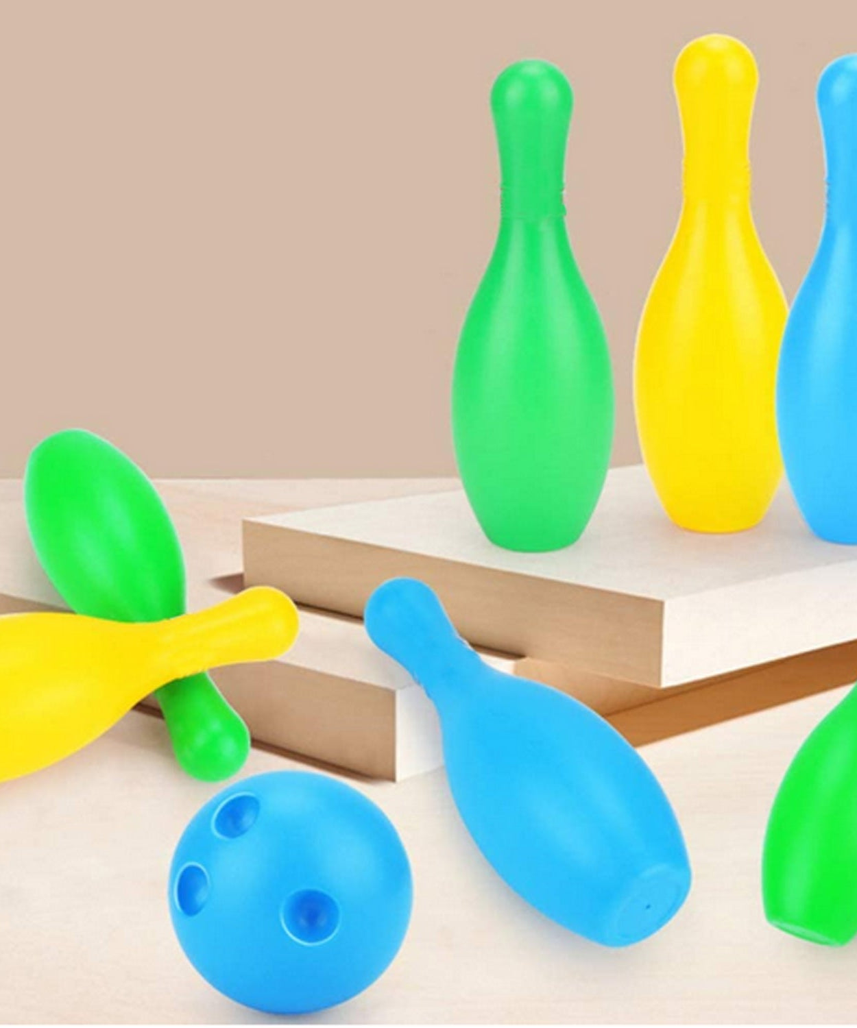 Bowling game set in action with kids playing