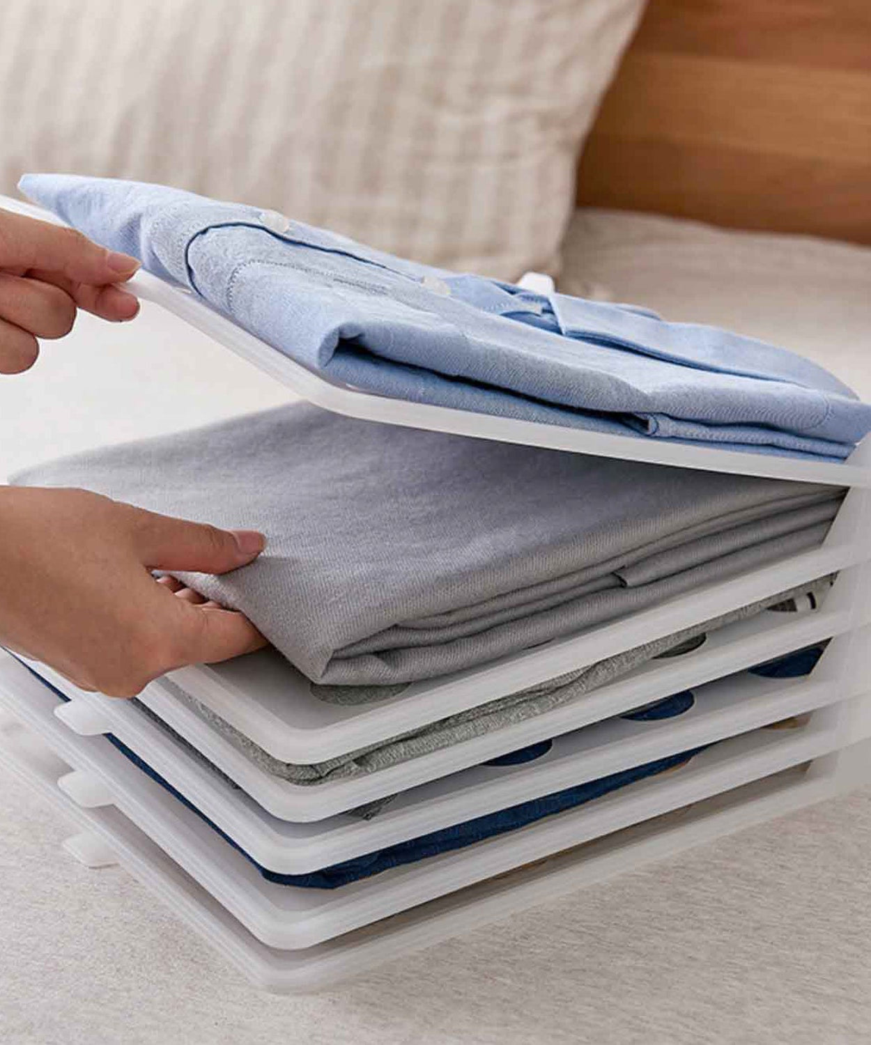 Space-saving cloth organizer for efficient fabric storage and arrangement.
