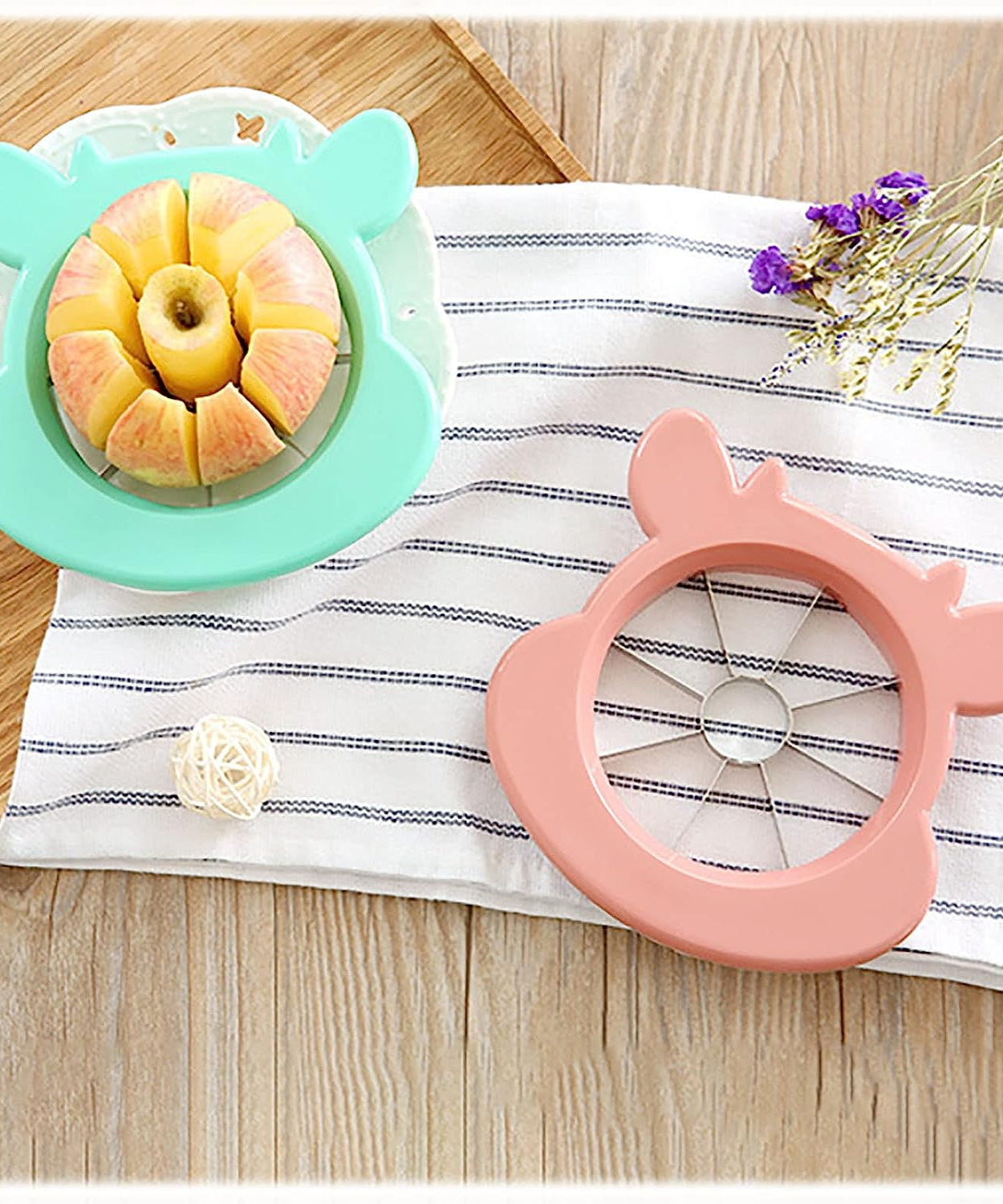 Multi-functional apple cutter, corer, and peeler with stainless steel for kitchen use.