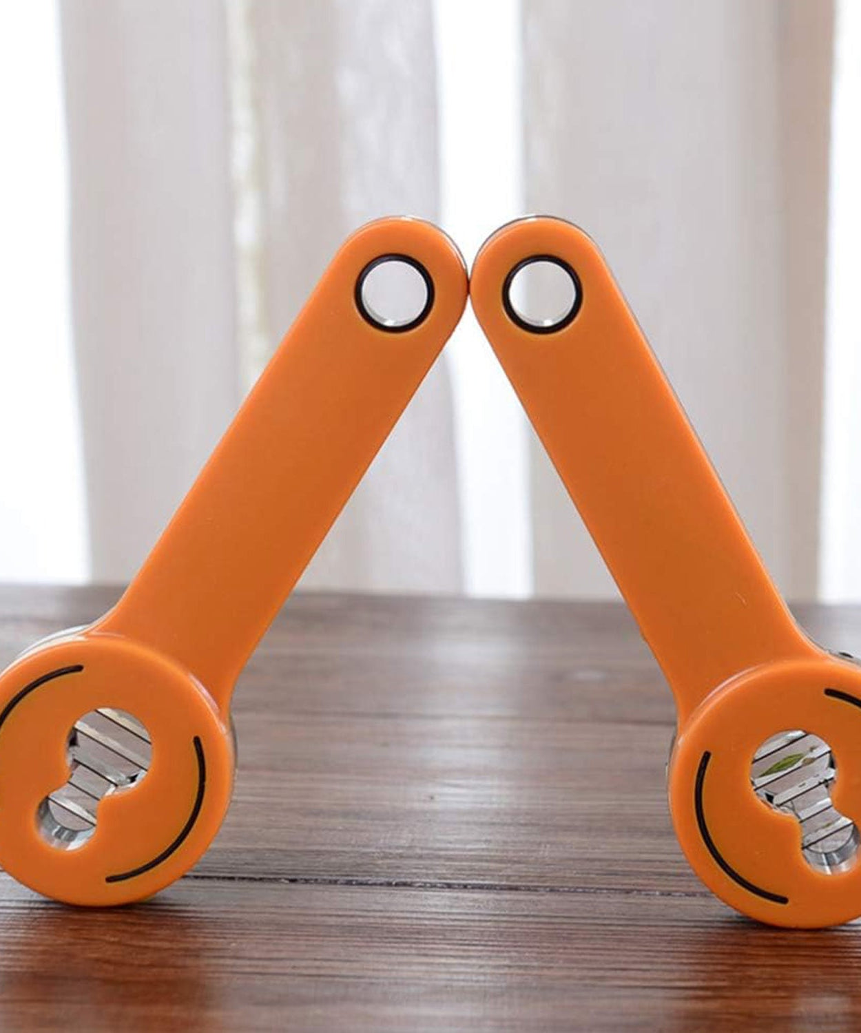 Efficient kitchen gadget for slicing and shredding green vegetables.