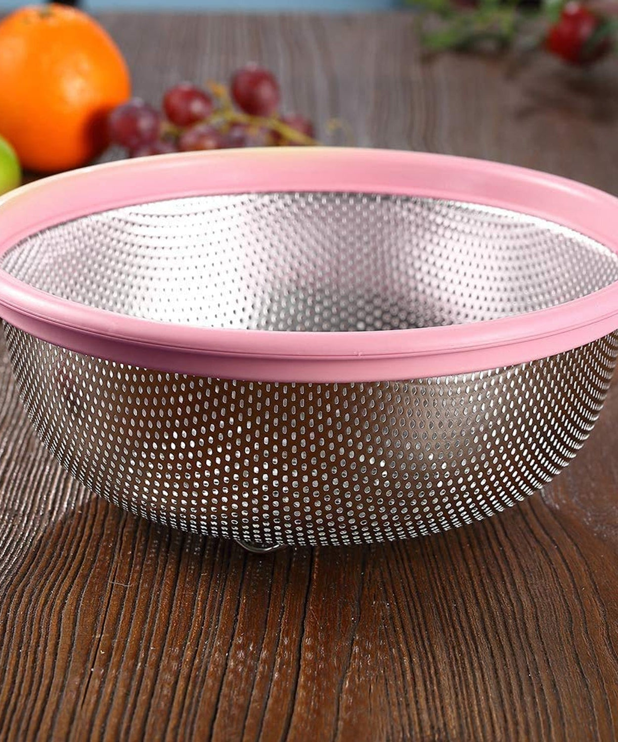 Green metal colander with pasta