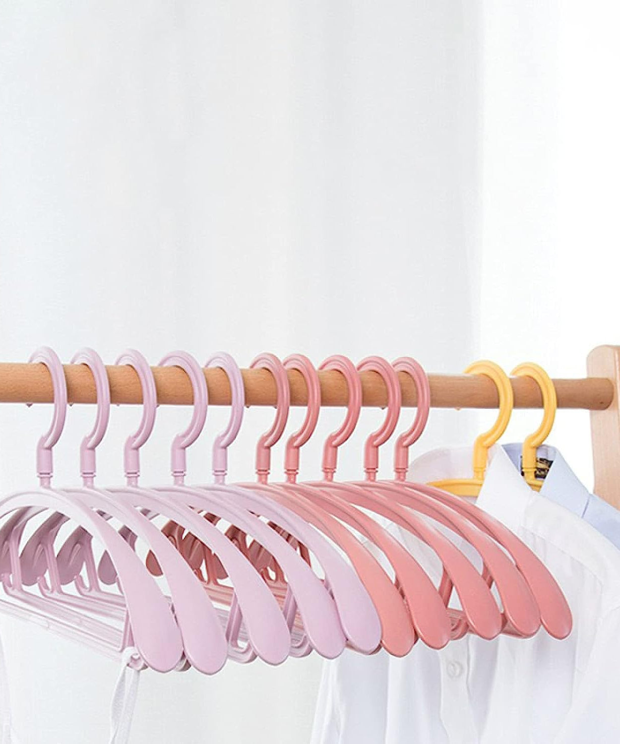Sleek plastic hangers for clothing