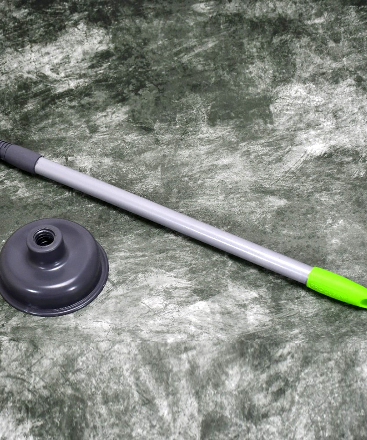 Toilet plunger with a red rubber cup, angled view