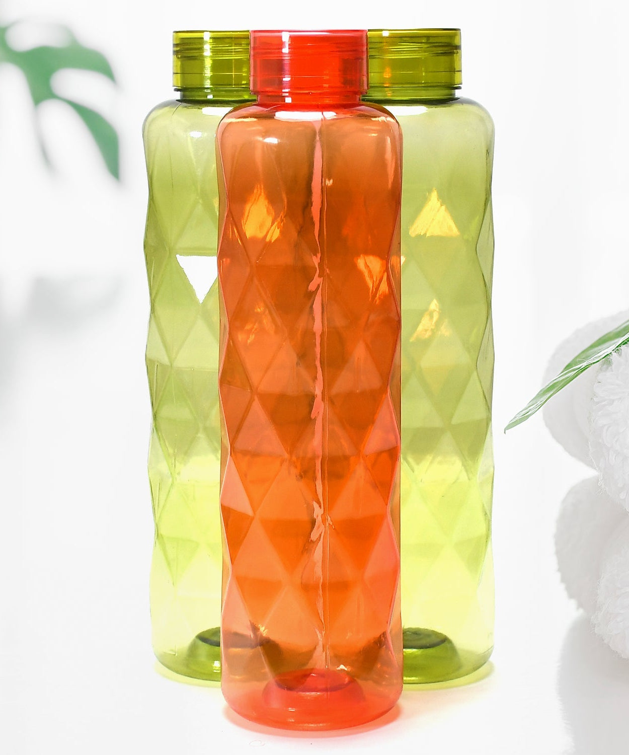 Diamond-cut bottle featuring a unique design for storing beverages.
