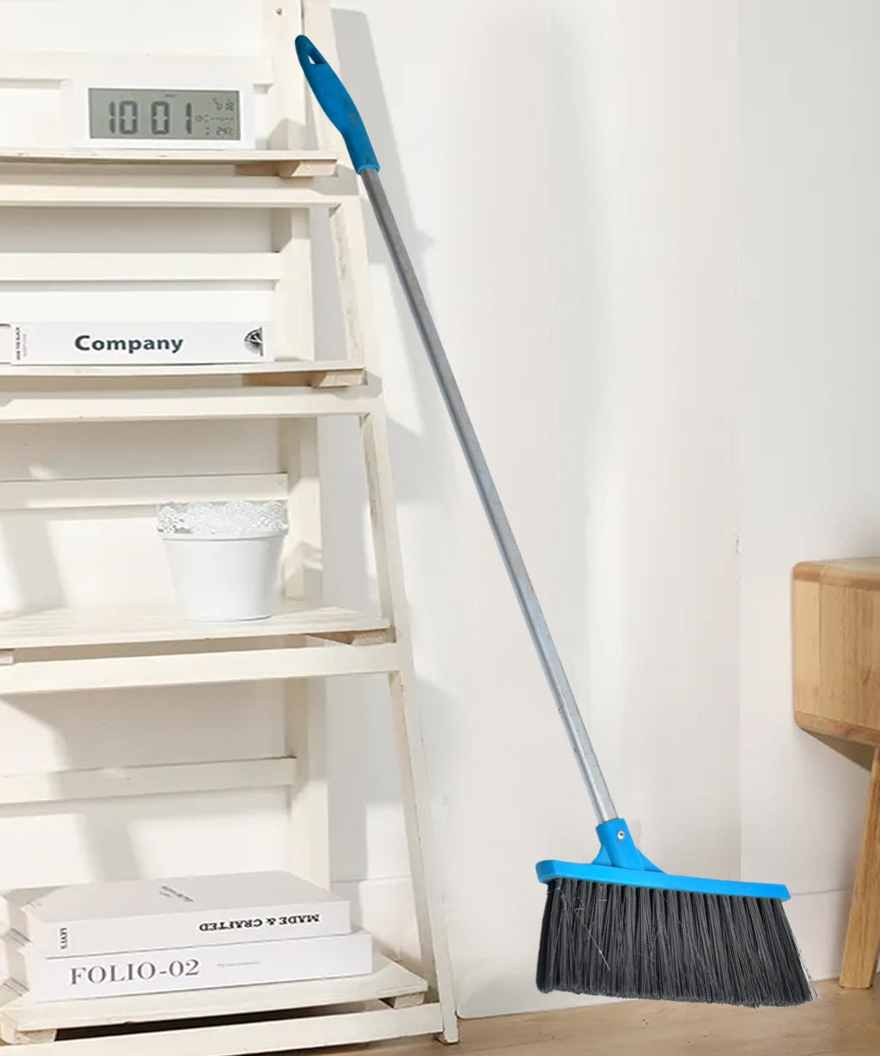 Long-handle floor scrub brush with stiff bristles for cleaning showers and tiles.