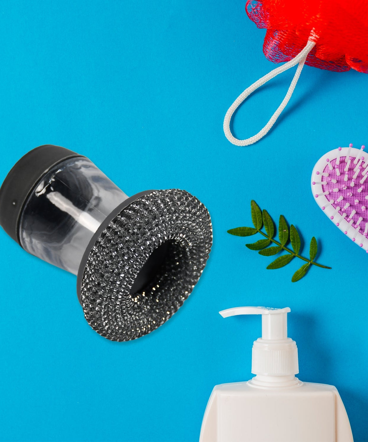 Soap dispensing dish brush with ergonomic handle for easy kitchen cleaning