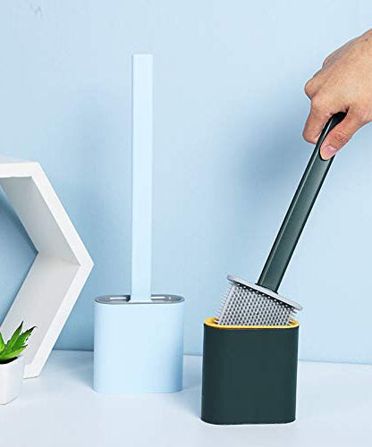 Durable silicone brush with stand for bathroom hygiene.