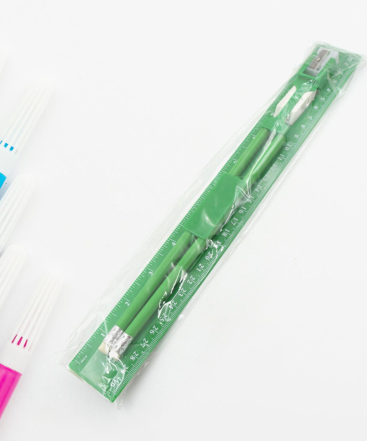 Essential school supplies including a ruler