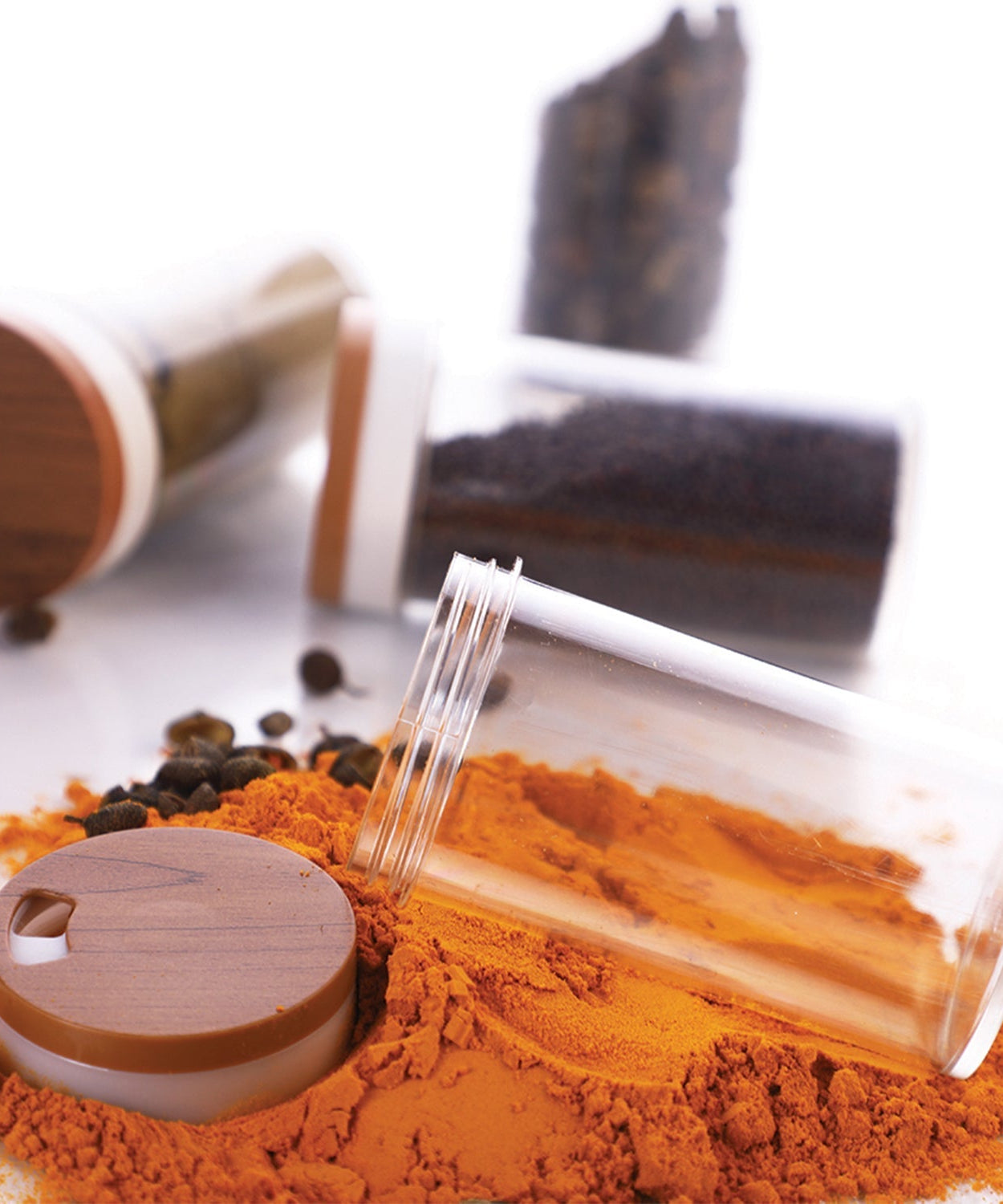 Ganesh Storewell plastic spice rack with 8 jars.