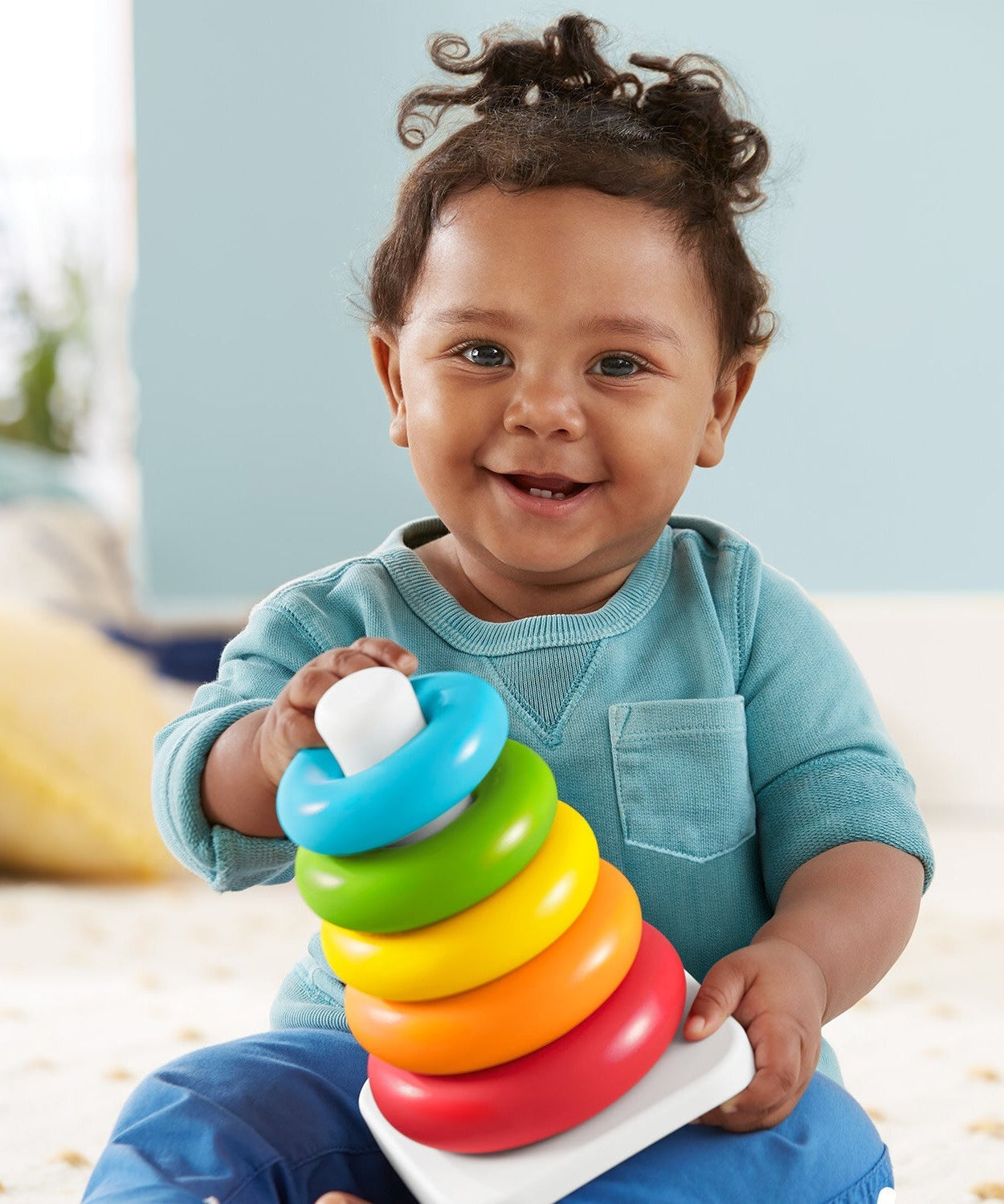 Colorful plastic stacking rings in teddy bear theme