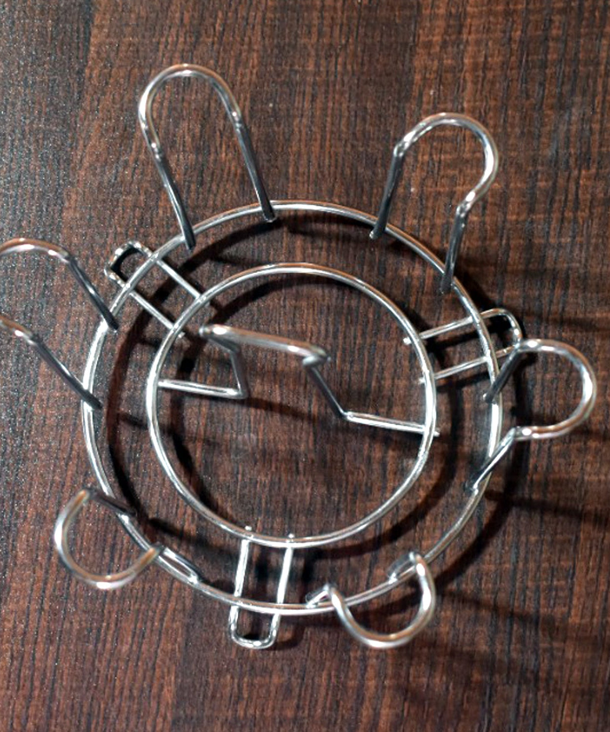 Elegant round glass stand for kitchen and household use