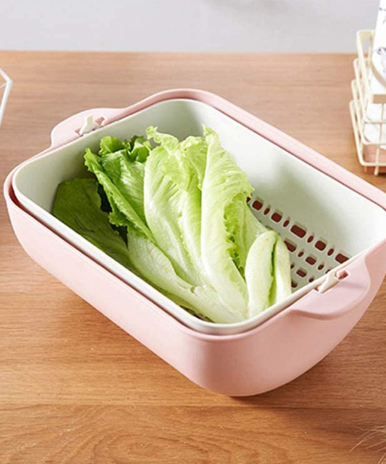 Rotatable strainer bowl with handles, perfect for fruit and veggie washing