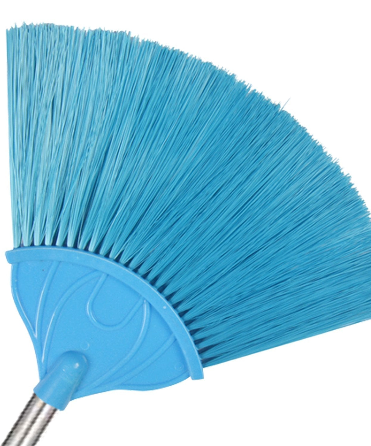 Broom leaning against a wall