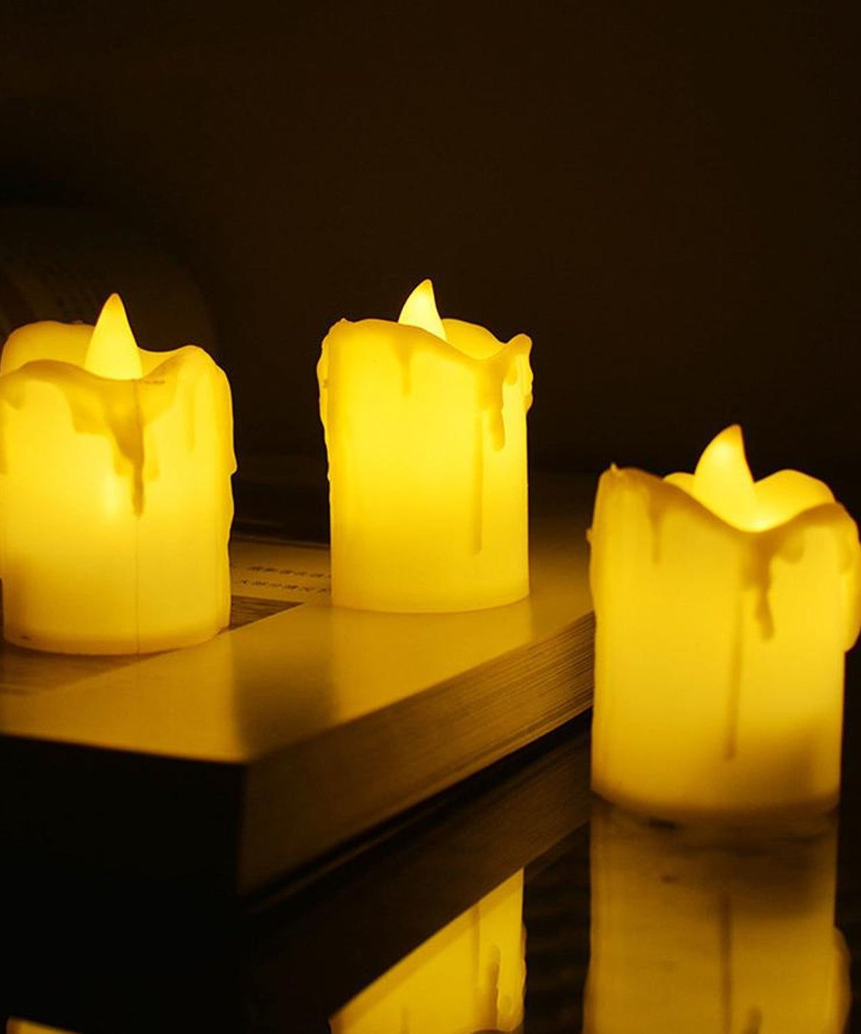 24pc flameless candles with melted design.