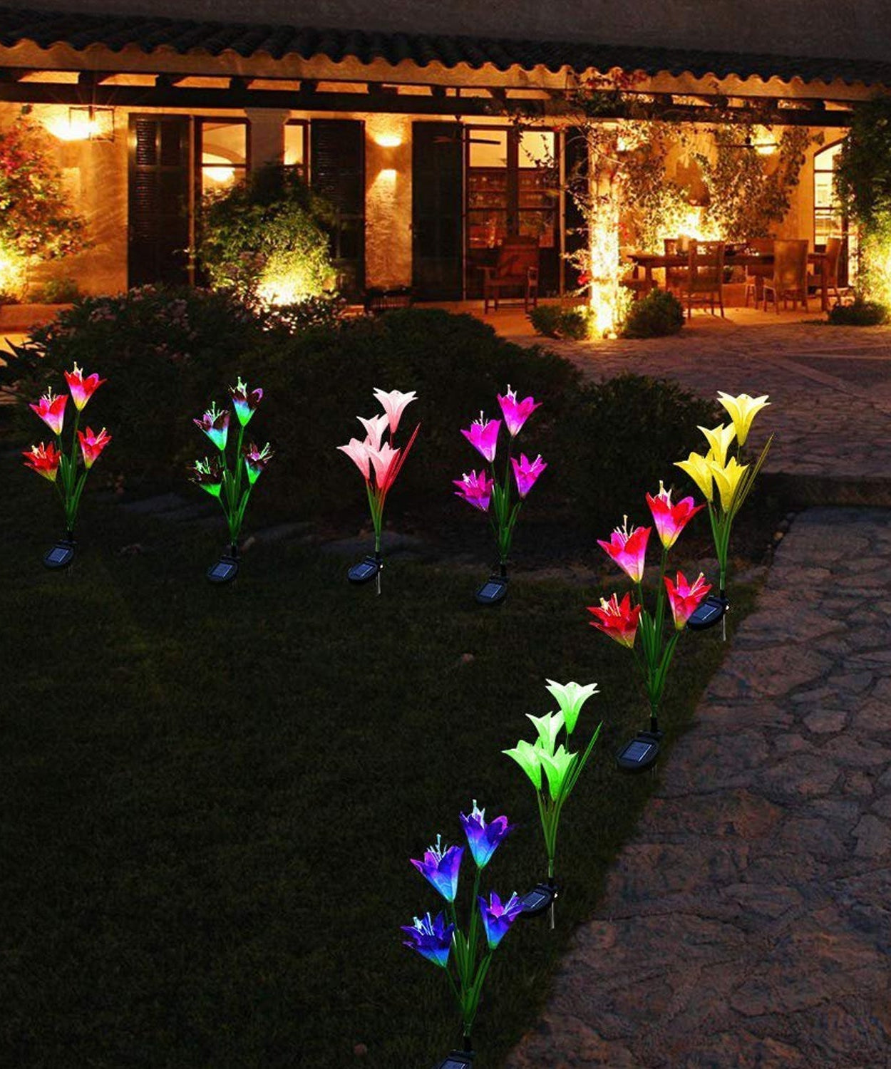 Solar lily flower stake lights, outdoor, glowing in garden
