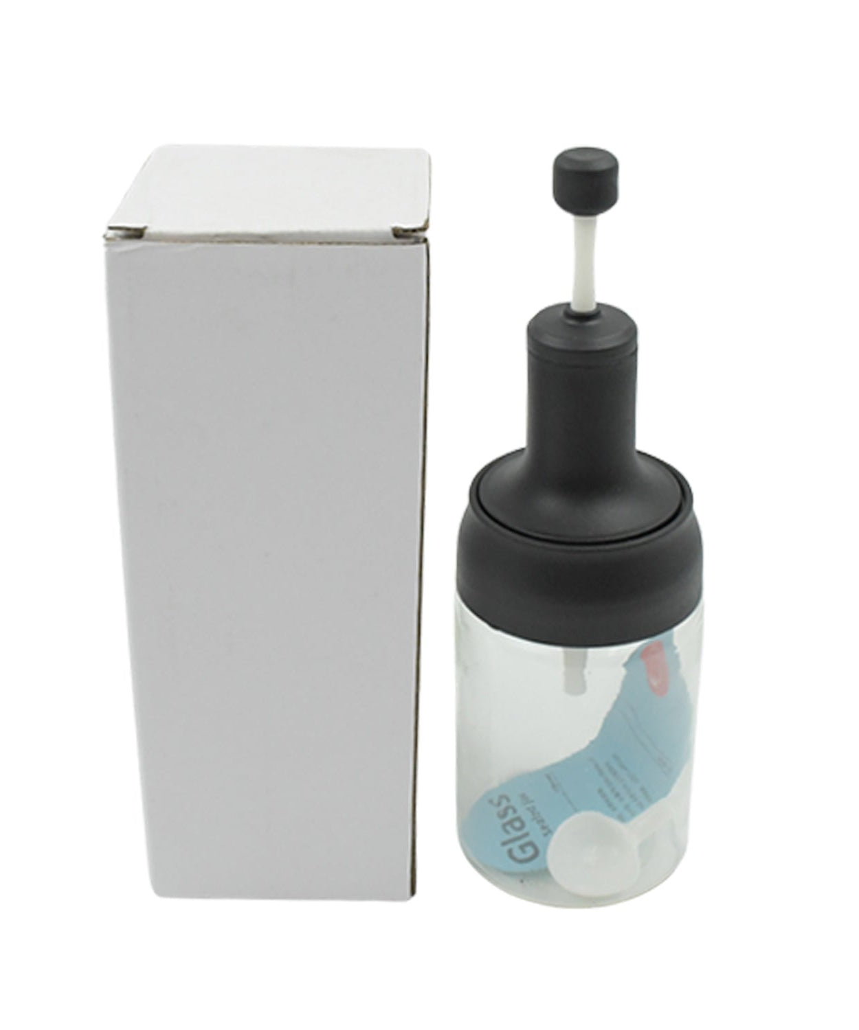 Glass seasoning jar with lid and spoon for easy serving.