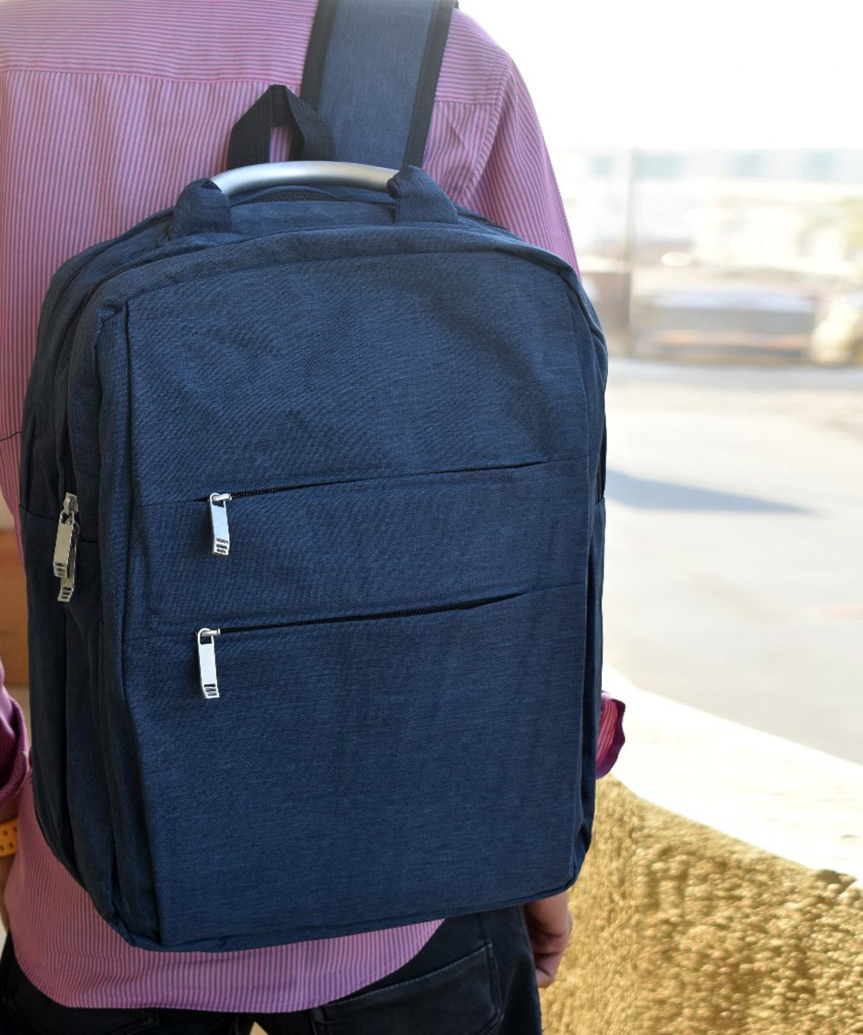 Laptop bag in use, carrying a laptop.