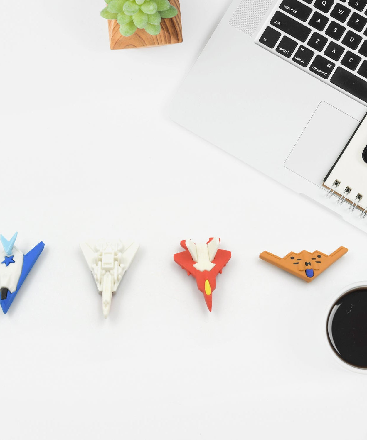 Gift set of fun erasers with gun and plane shapes