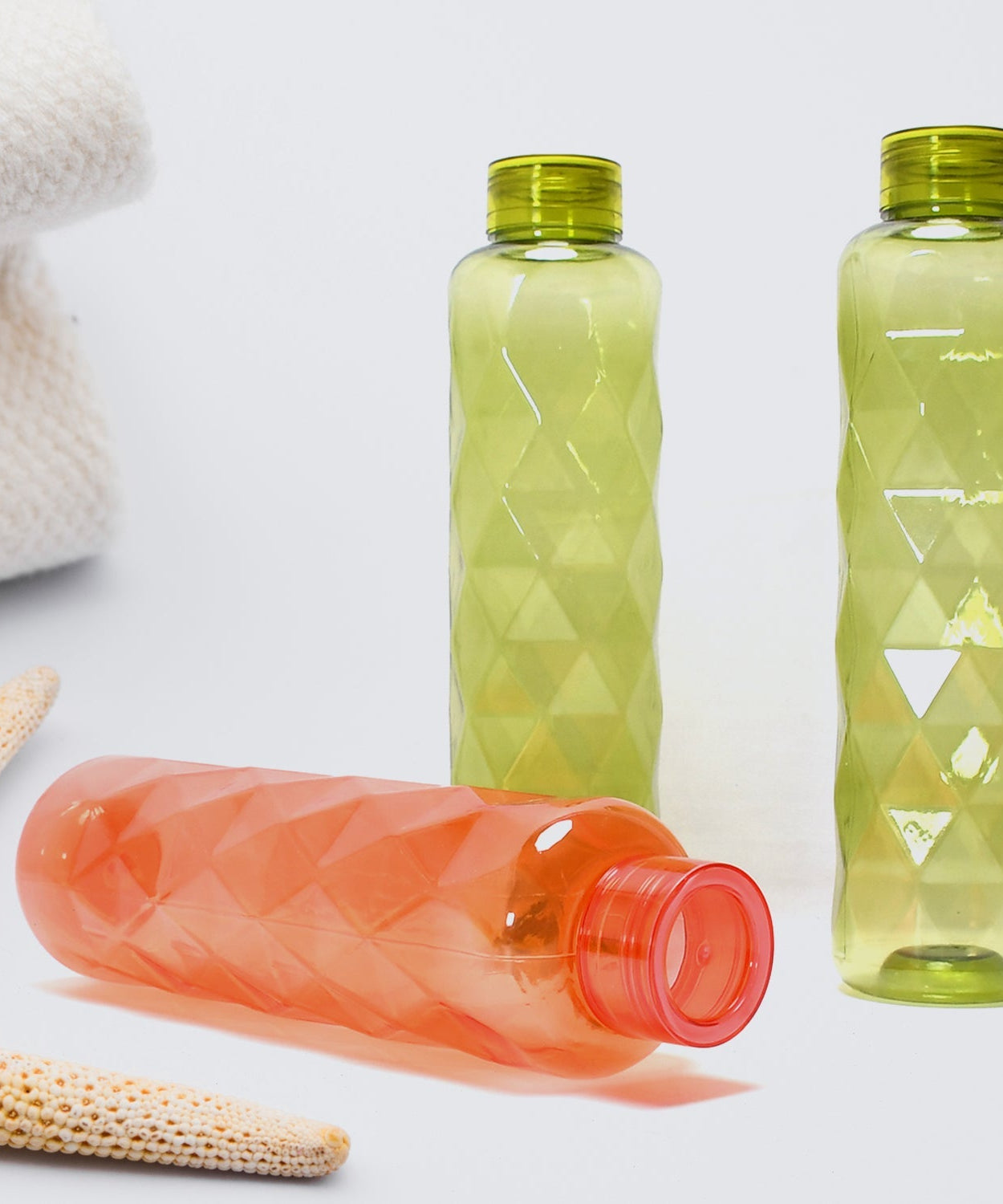 Bottle with a diamond-cut texture, perfect for stylish beverage storage.