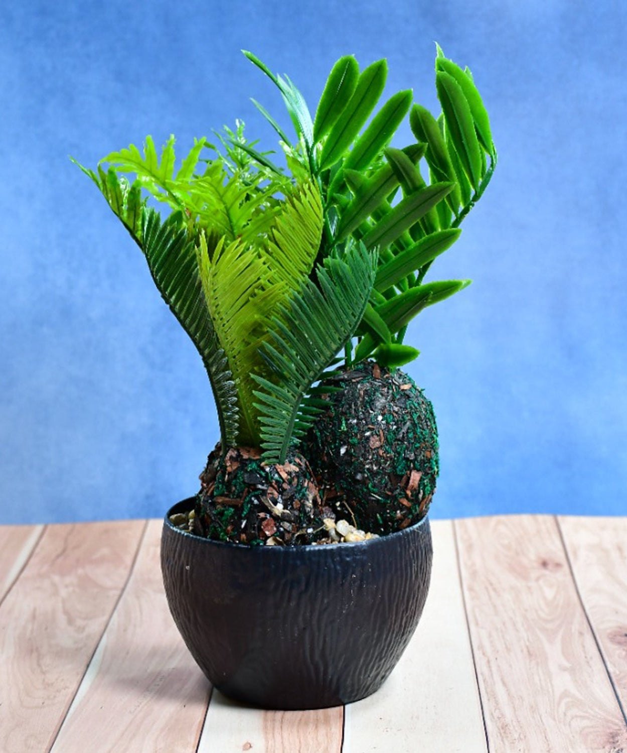 Artificial plant in a stylish pot with lush greenery