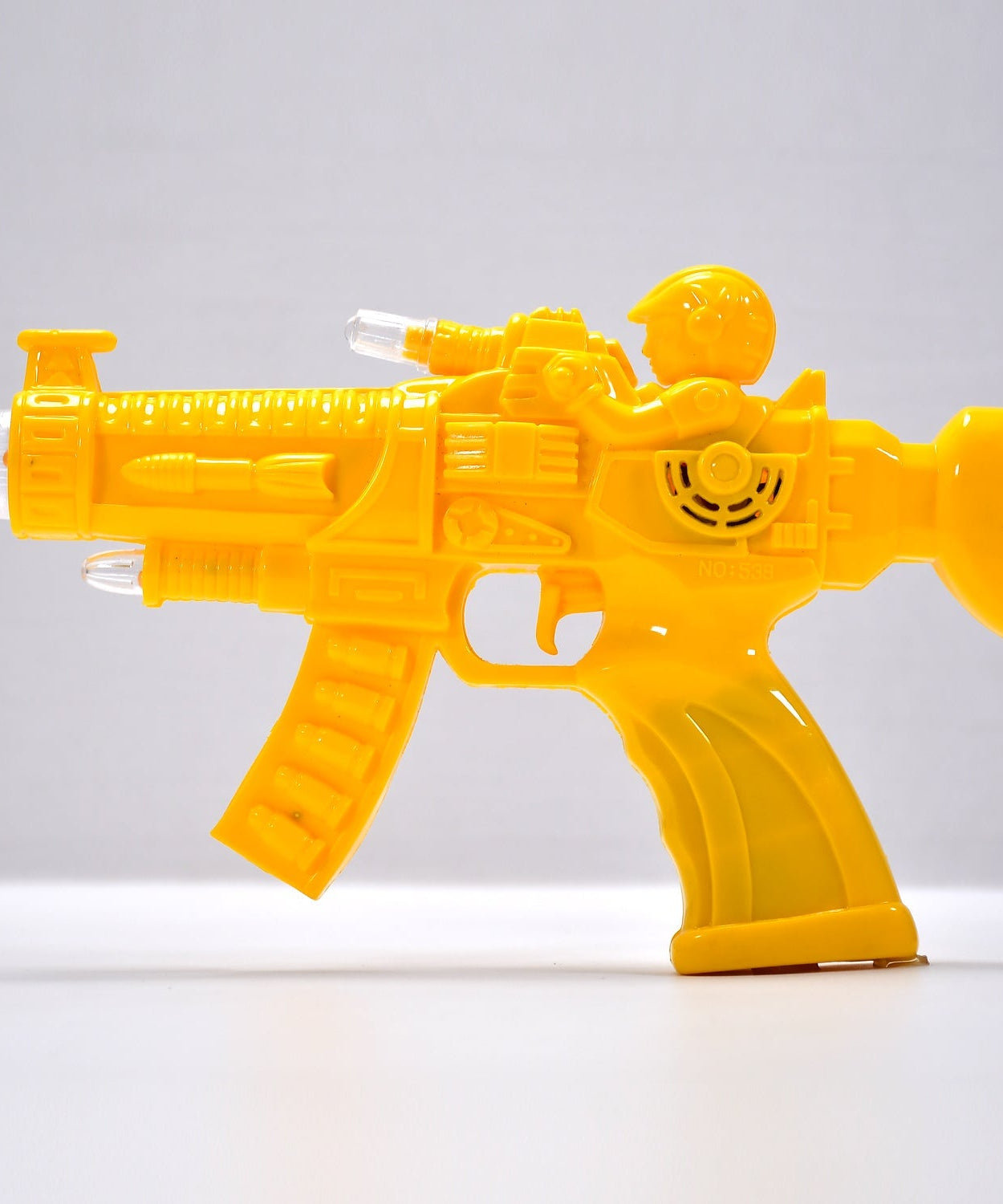 Transparent musical gun with glowing gears and lights