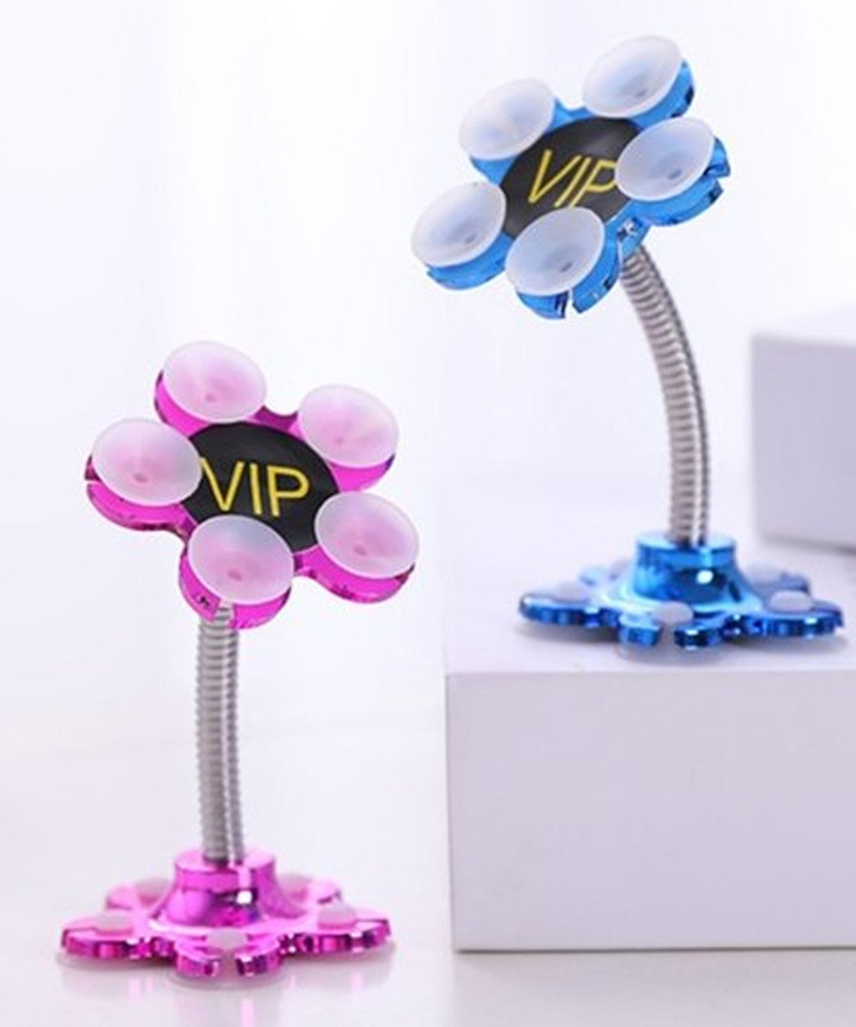 VIP phone stand with rotatable feature and suction cups.