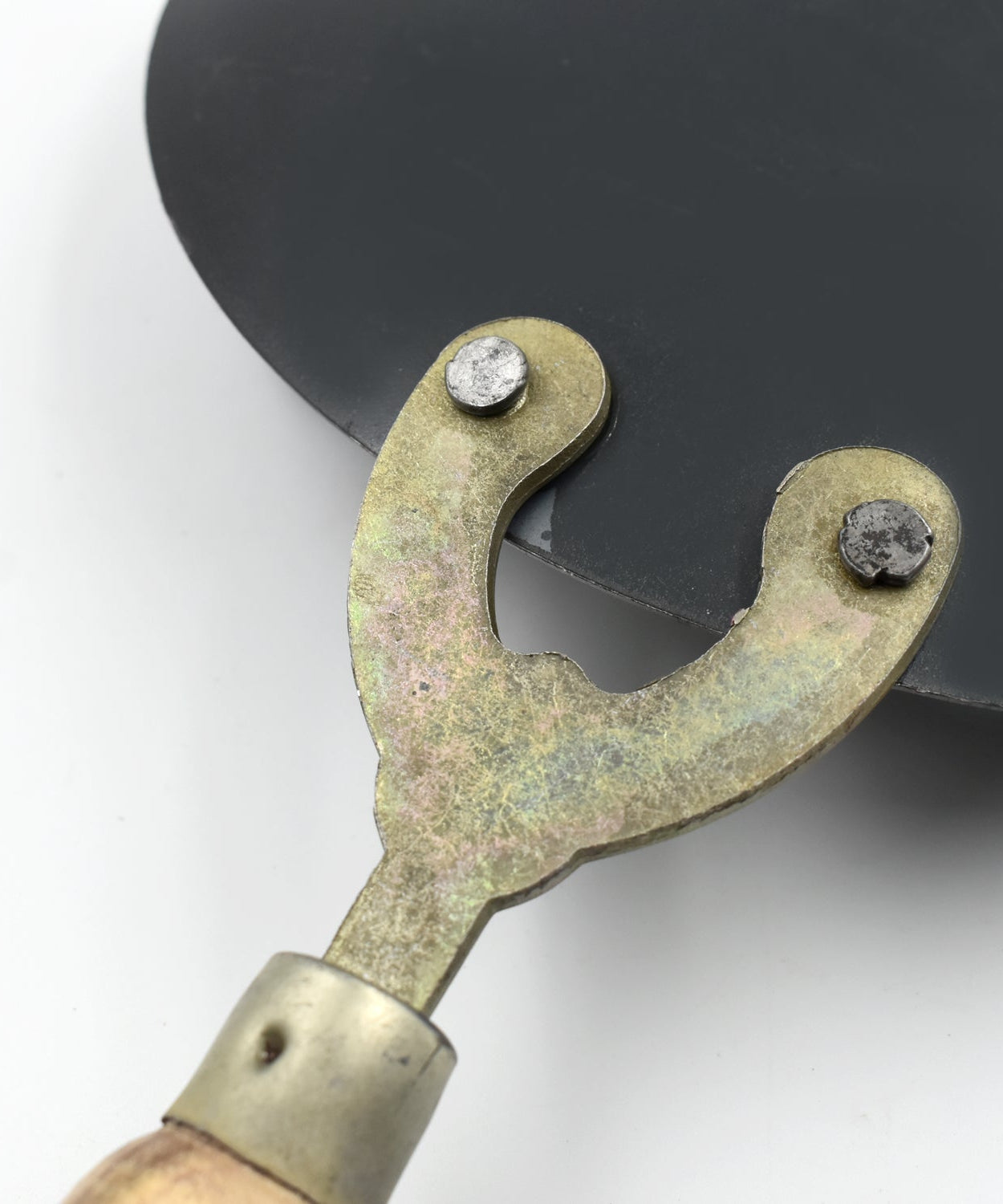 Sturdy wooden handle roti tawa, ideal for making soft rotis and crispy parathas.