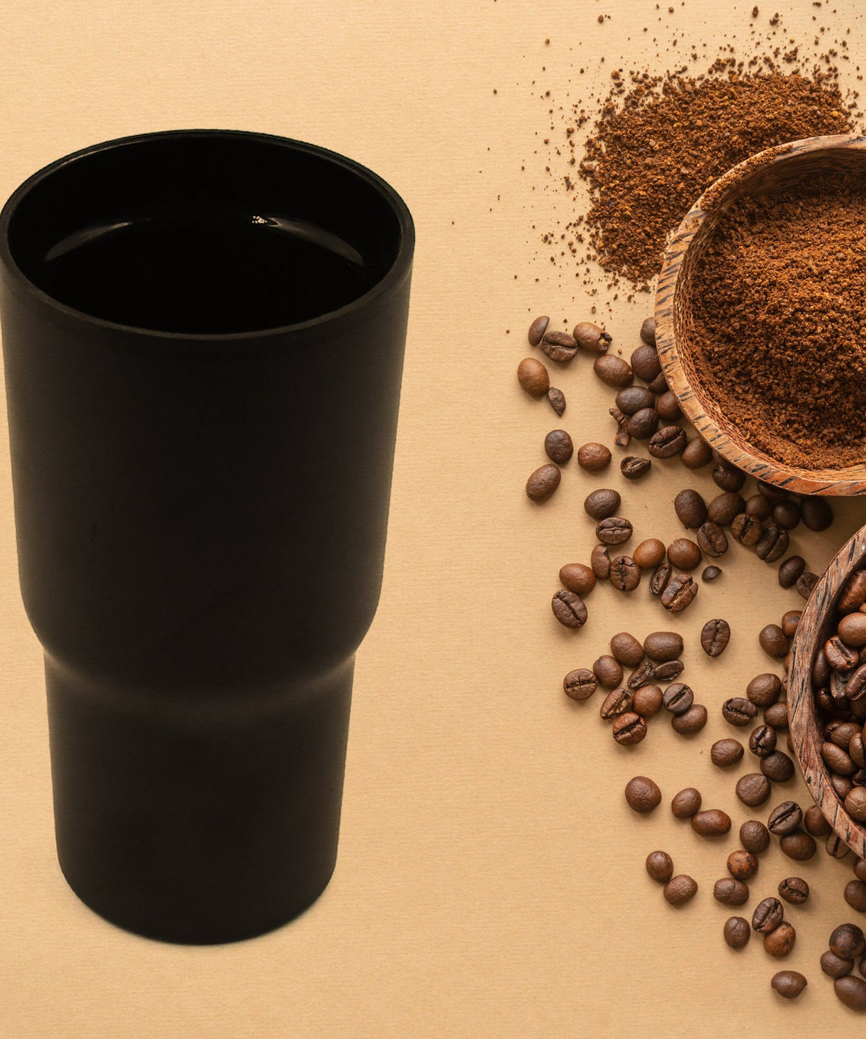 Stainless steel vacuum-insulated travel coffee mug.