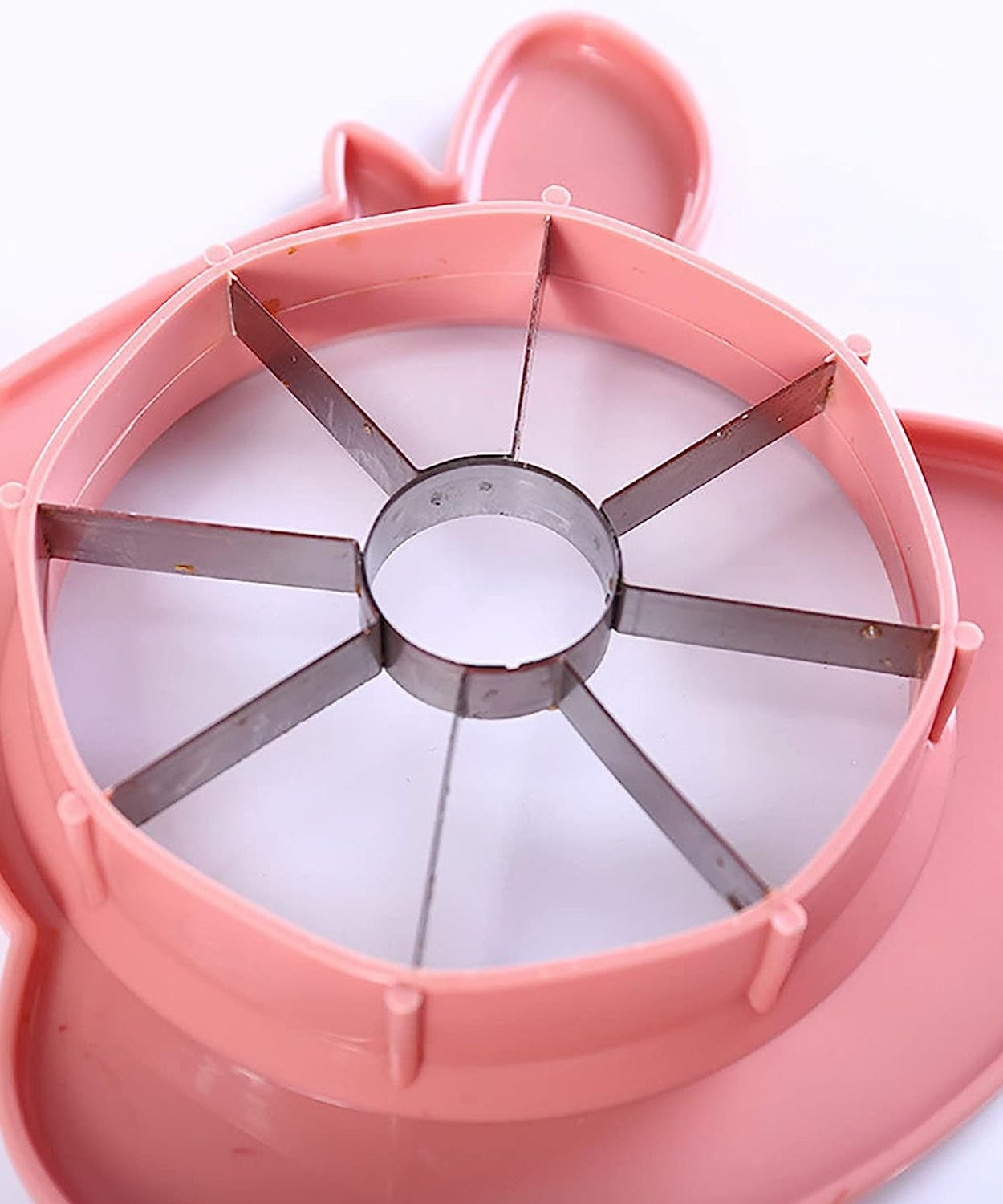 Stainless steel apple slicer and peeler tool, designed for efficient fruit preparation.