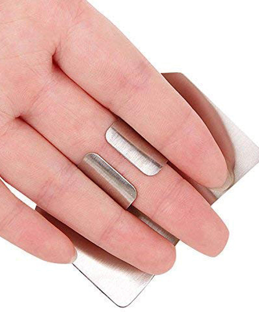 Kitchen finger guard made of stainless steel for safe chopping.