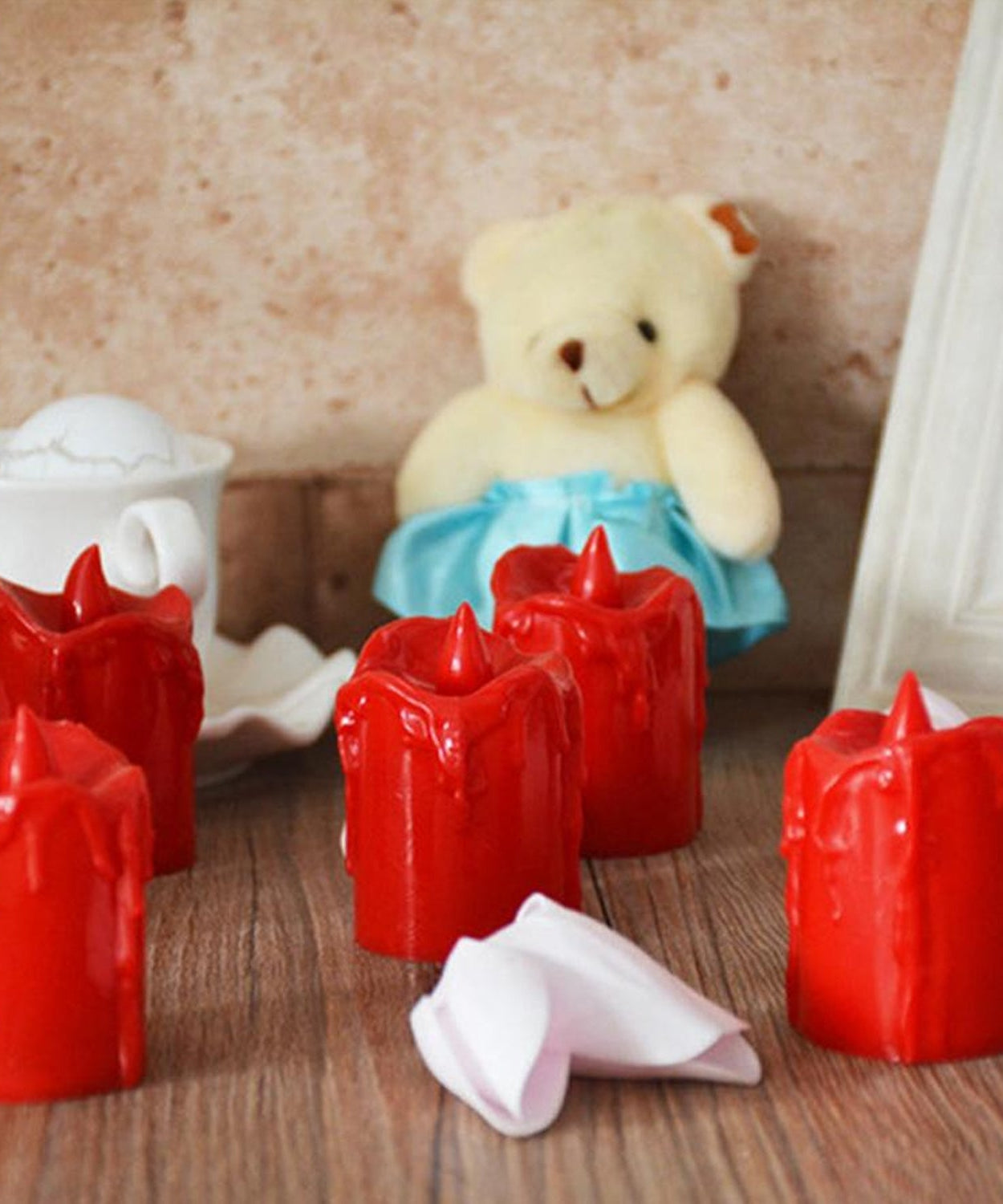 Set of flameless candles with a melted look.