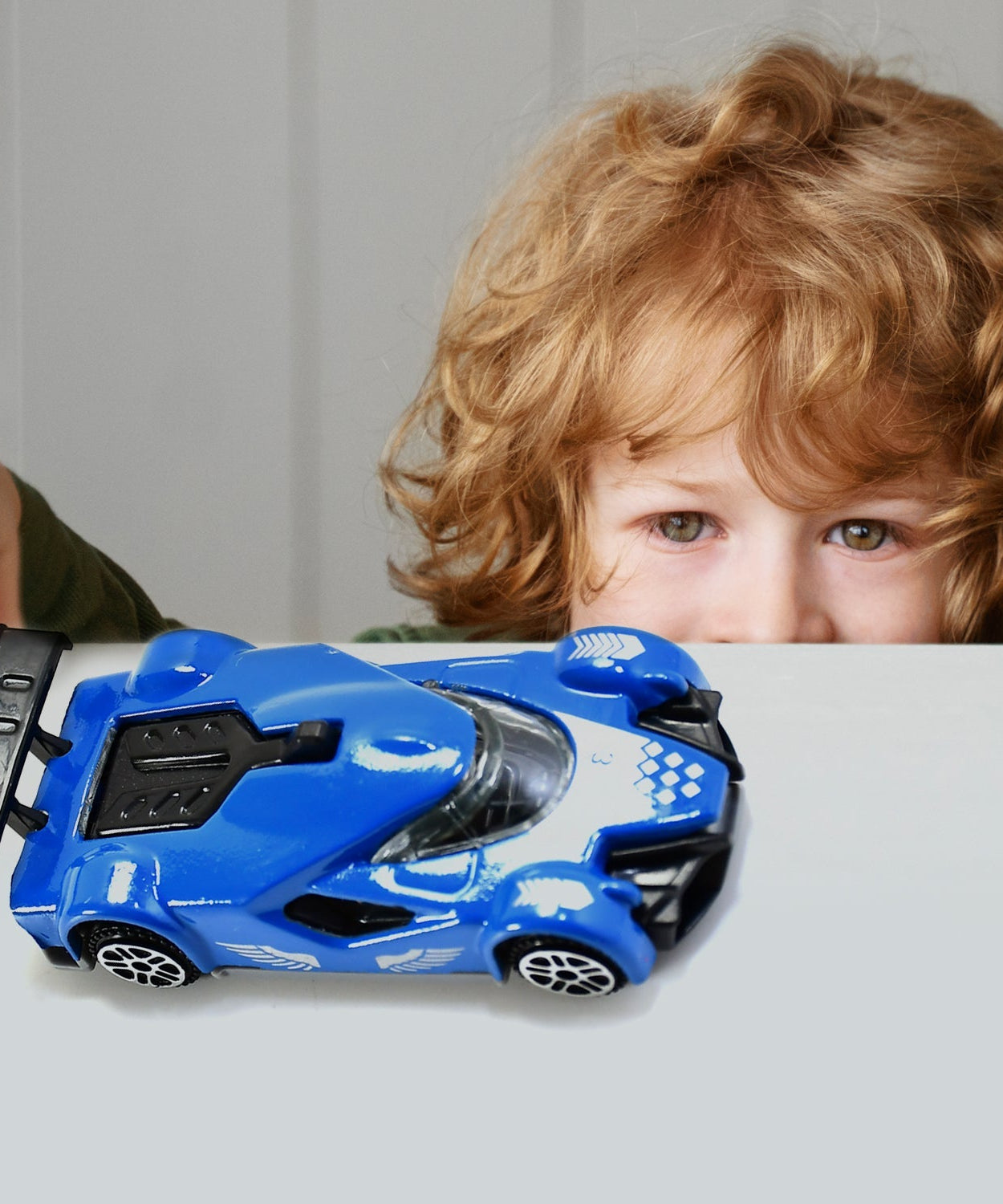 Die-cast metal race car toy, rear view