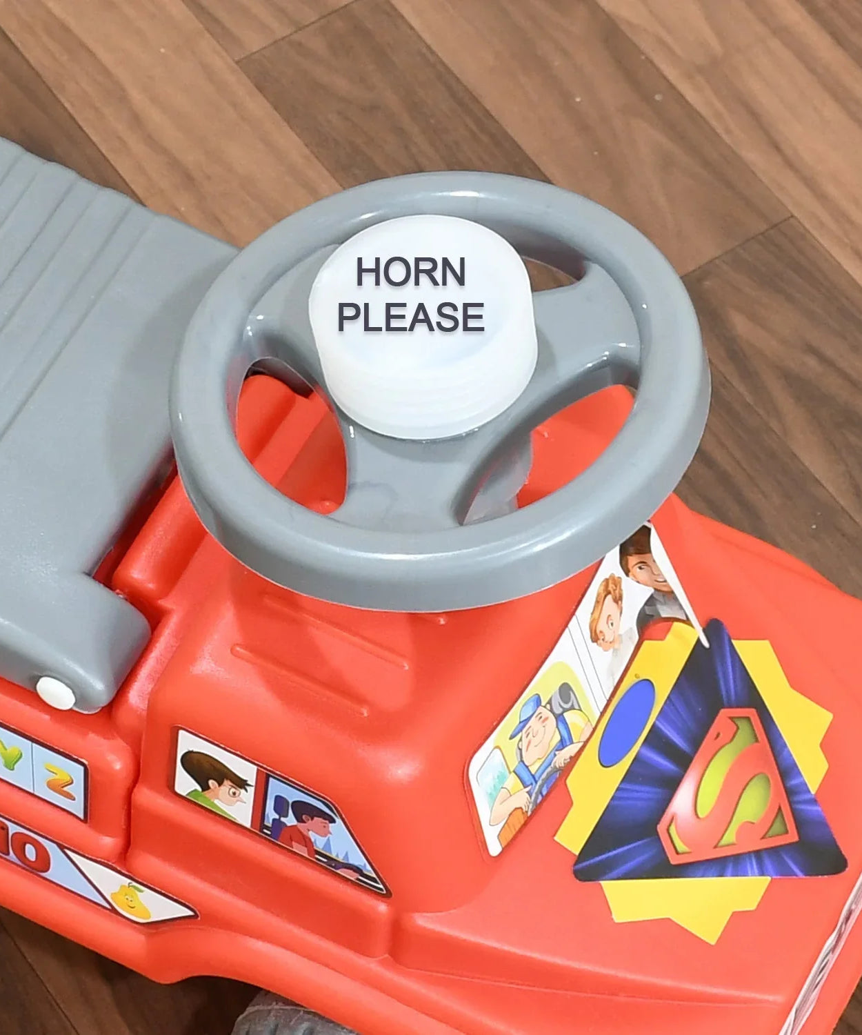 Ride-on toy truck with musical horn and backrest