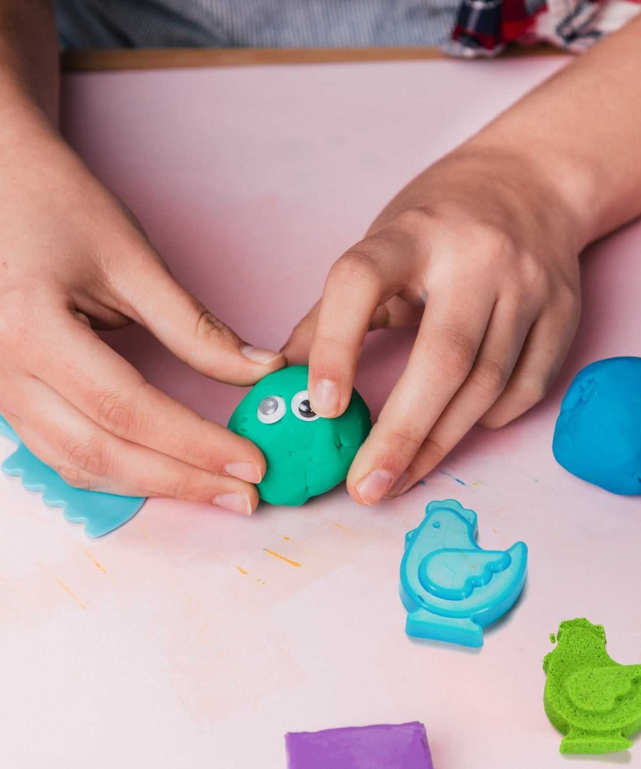 Kinetic sand set with various play tools.