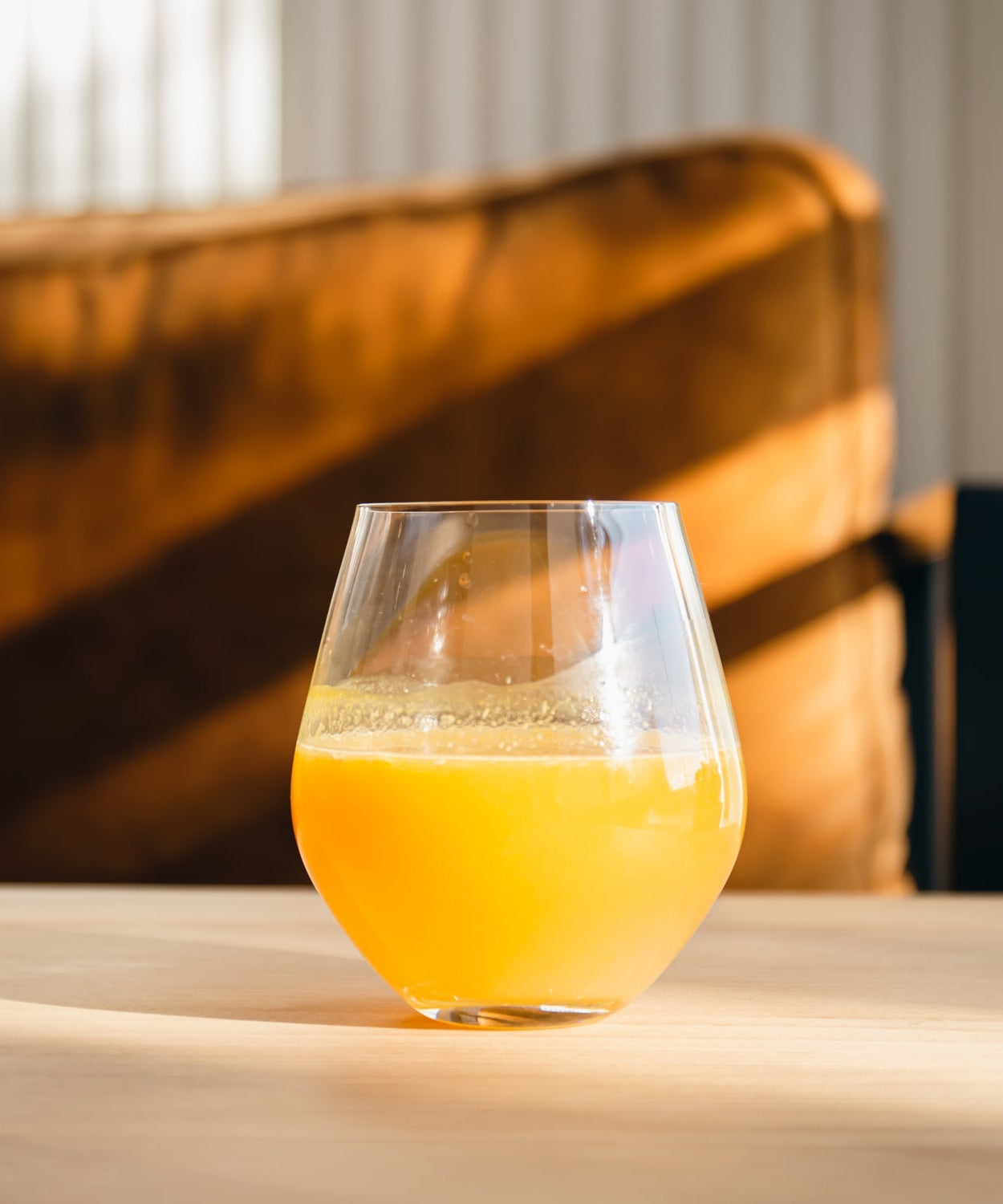 Plastic pilsner glass with beer