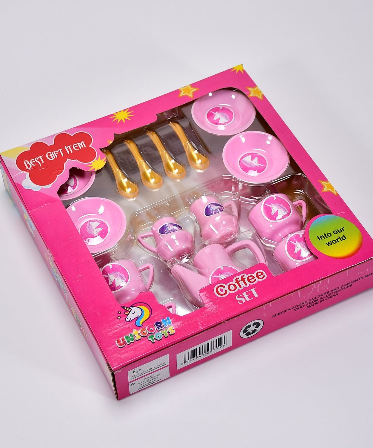 Toy tea set with cups, plates, and teapot