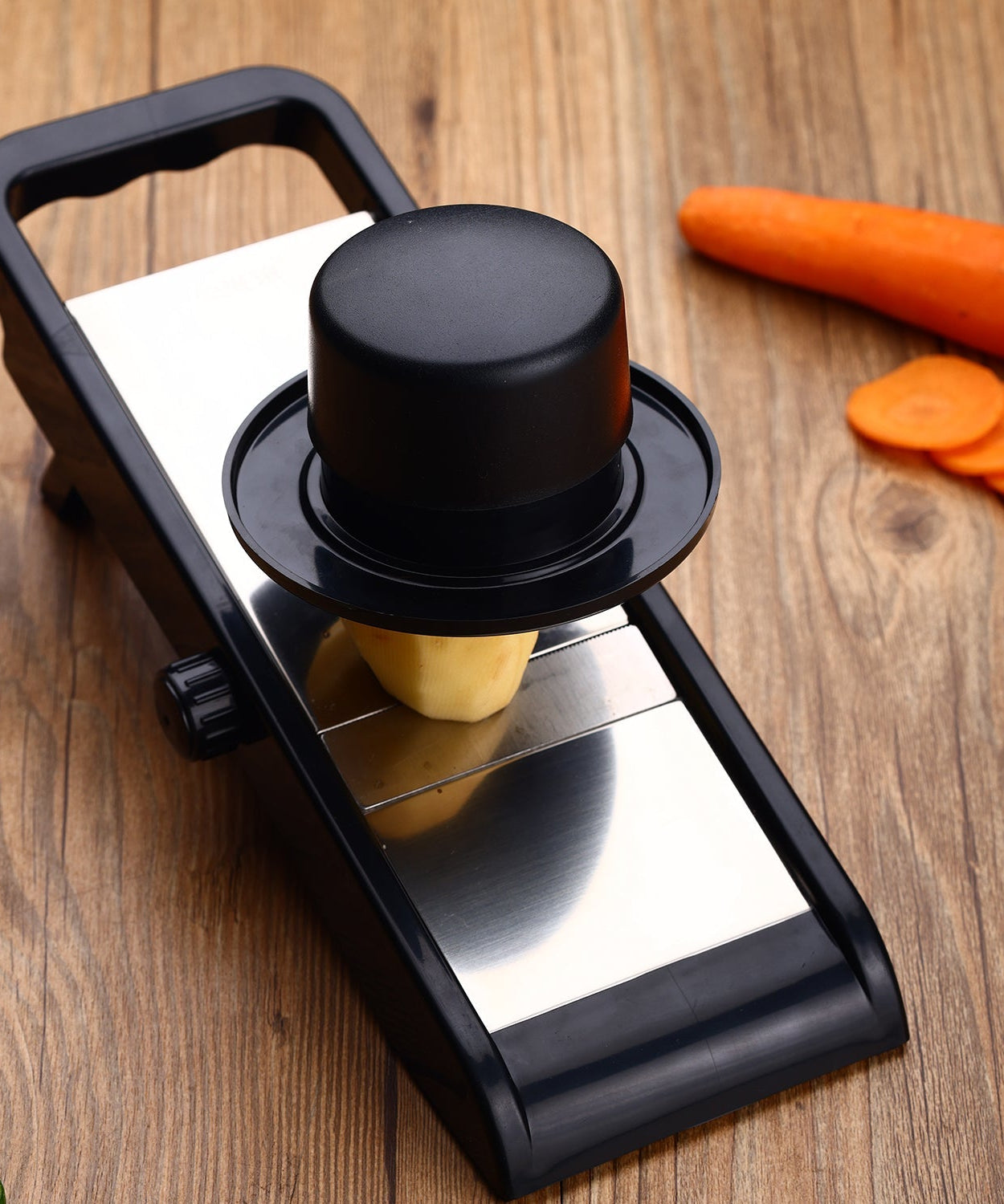 Premium potato and onion slicer and grater, adjustable for chips and vegetables.