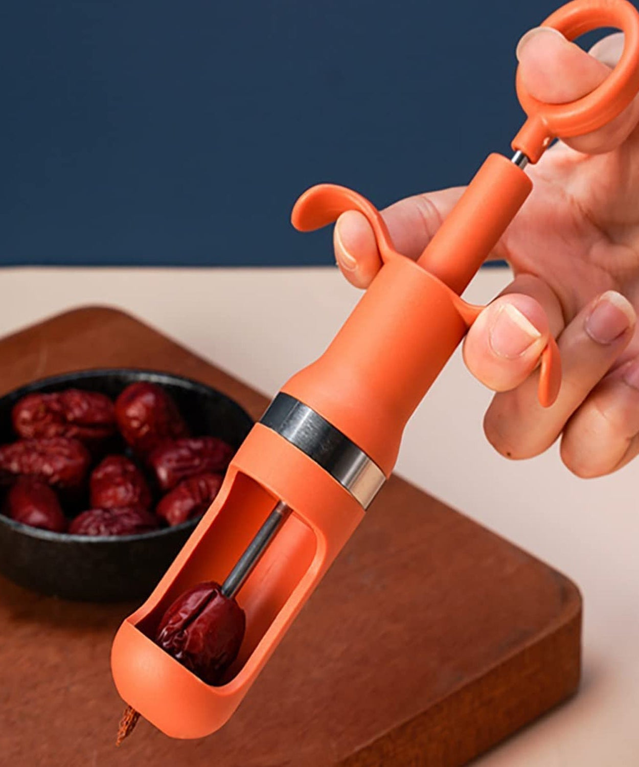 Easy-to-use cherry pitter tool for quick cherry pit removal.