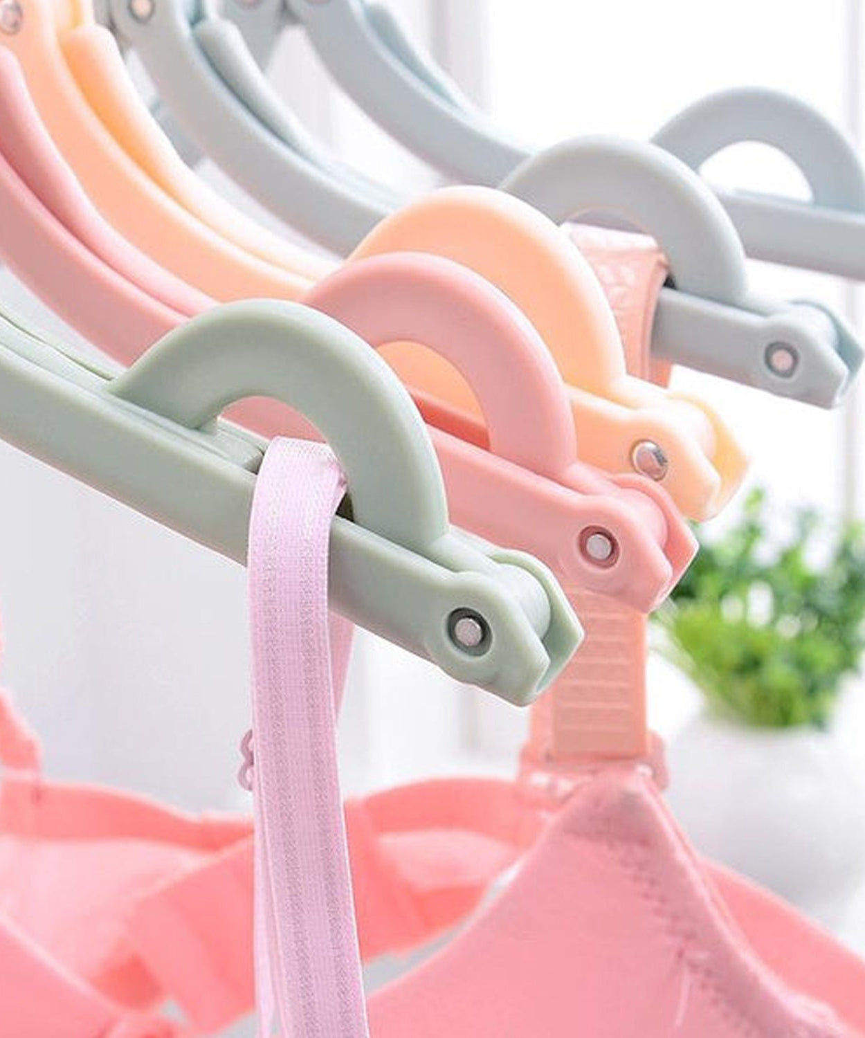 Foldable travel hangers, perfect for organizing and drying clothes.