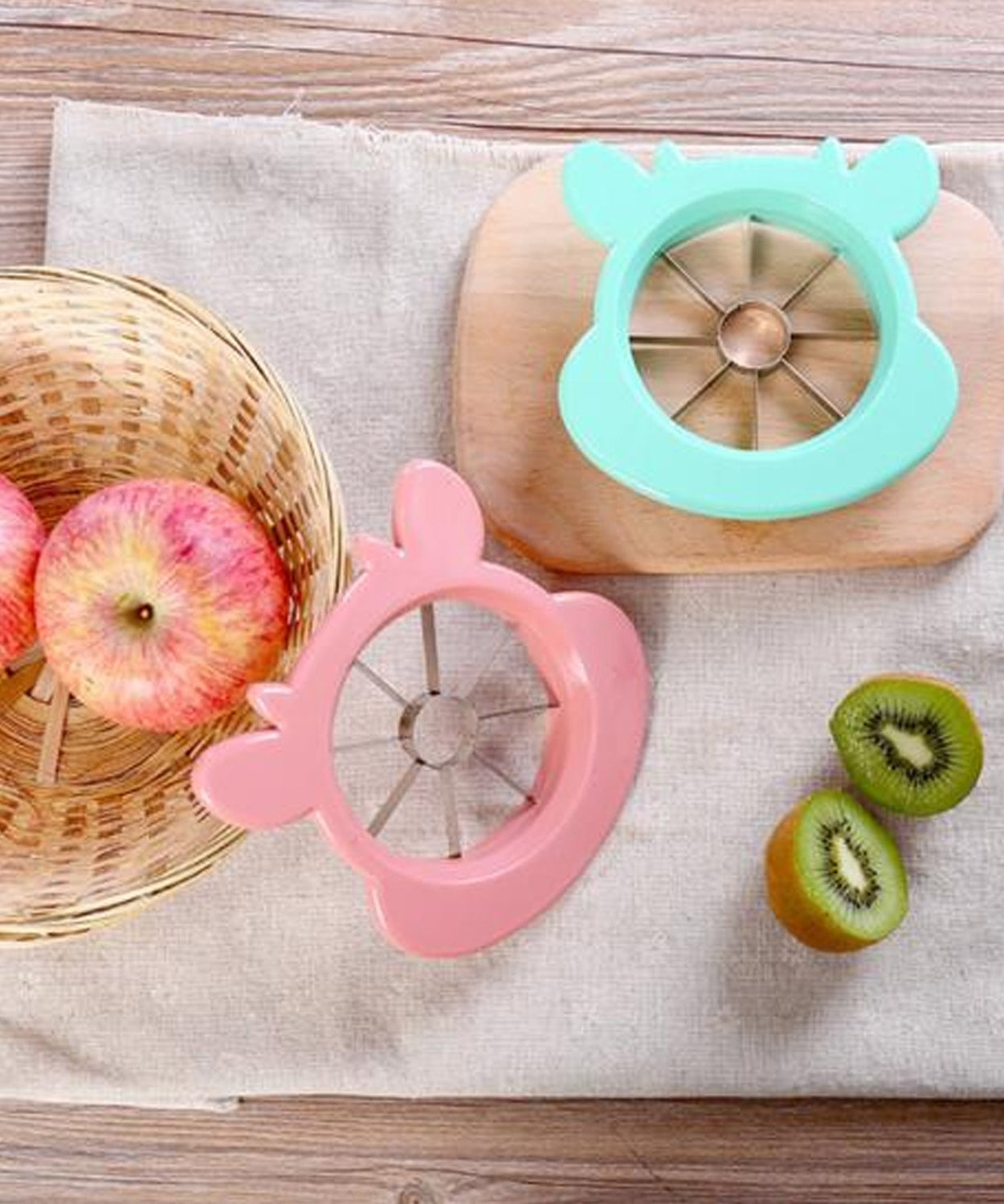 Apple cutting and coring tool with stainless steel blades for quick fruit slicing.