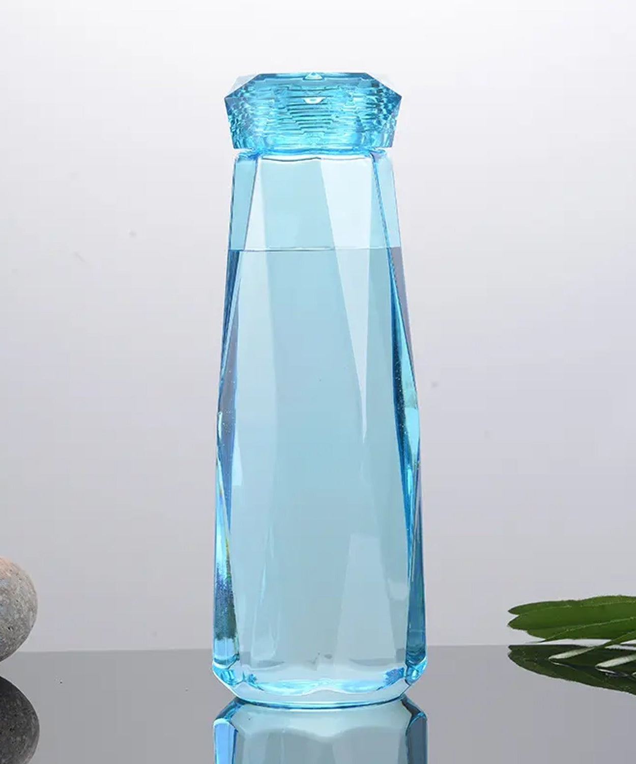Glass water bottle with plastic top
