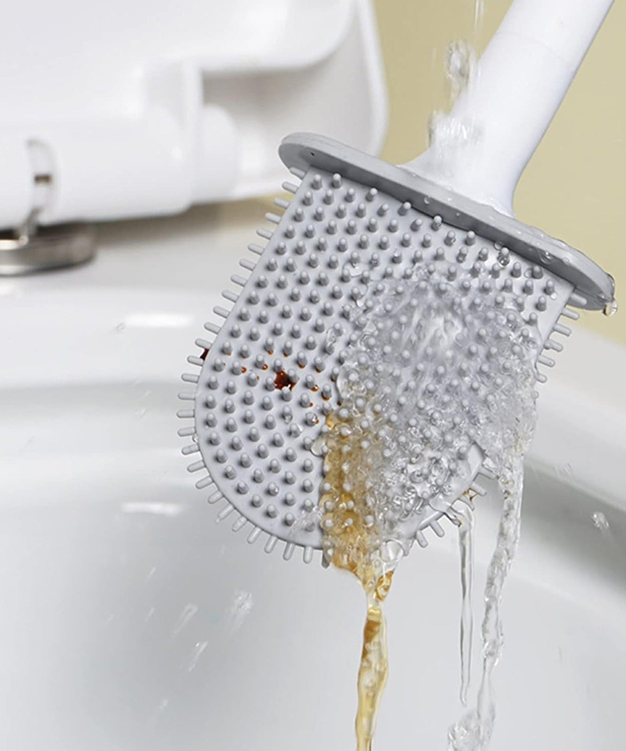 Bathroom brush with silicone handle