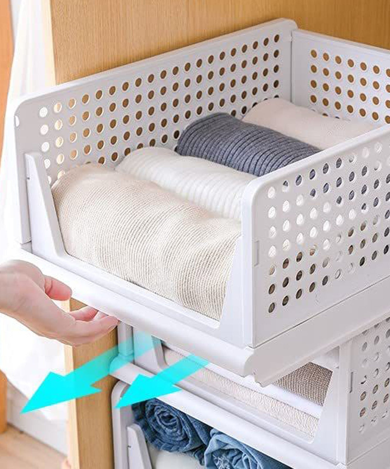 Foldable 3-layer organizer for clothes, ideal for use in wardrobes or cupboards.